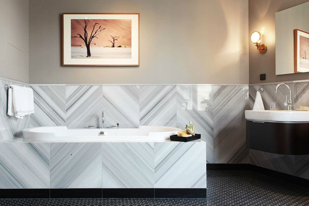 Tips For Designing A Bathroom With A Herringbone Tile Pattern